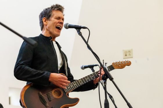 Kevin Bacon of the Bacon Brothers perform for inmates at Cook County Jail on September 21, 2024 in Chicago, Illinois.