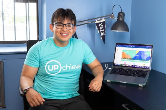 UPchieve student (Aaron Custodio) next to UPchieve on a computer